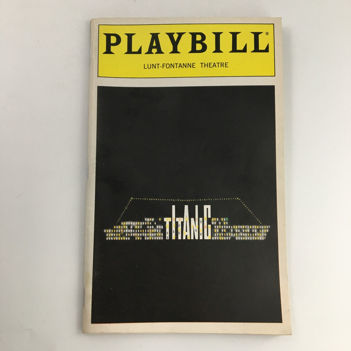 1997 Playbill Lunt-Fontanne Theatre 'Titanic' cover featuring the iconic logo and design.