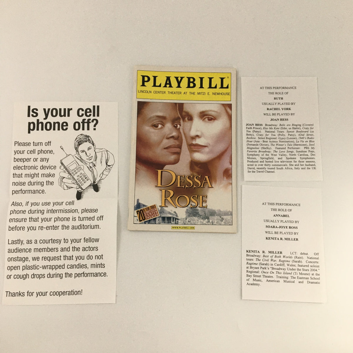 2005 Playbill for 'Dessa Rose' alongside informational papers on cell phone etiquette and performance details.