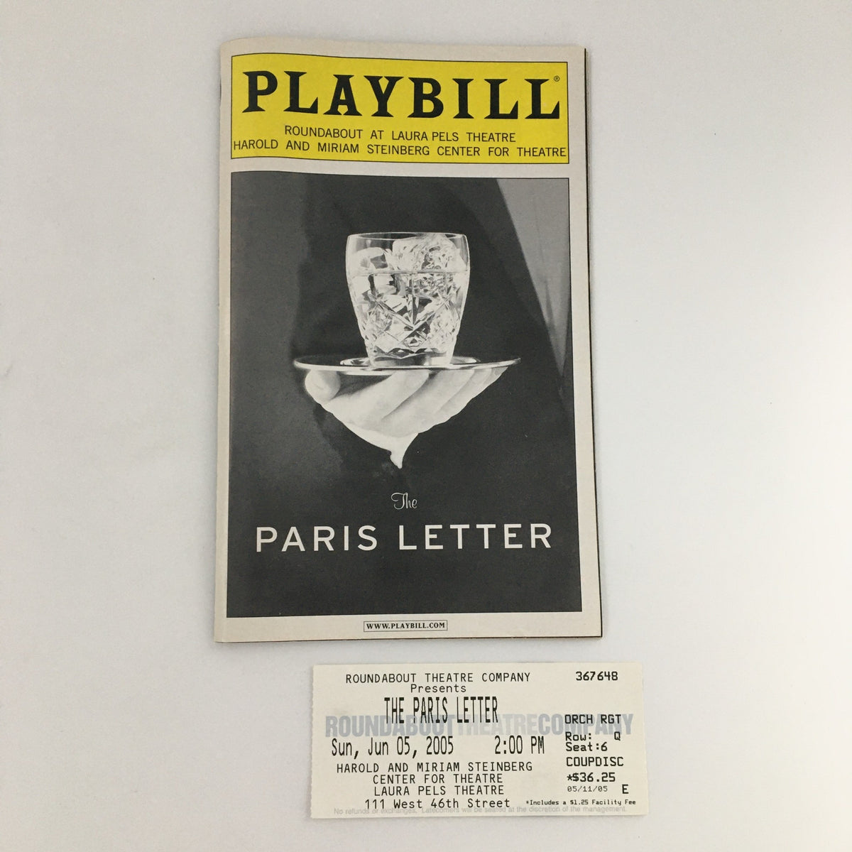 2005 Playbill of 'The Paris Letter' from Roundabout Theatre Company alongside the original ticket from the performance on June 5, 2005, featuring a glass of whiskey on ice.