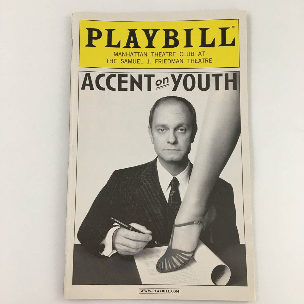 2009 Playbill for the production 'Accent on Youth' at the Samuel J. Friedman Theatre featuring a stylish cover image of an actor with a model's leg.