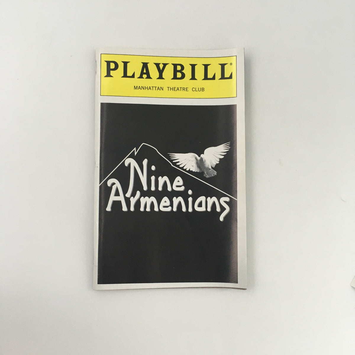 1996 Playbill titled 'Nine Armenians' featuring dramatic artwork from the Manhattan Theatre Club.