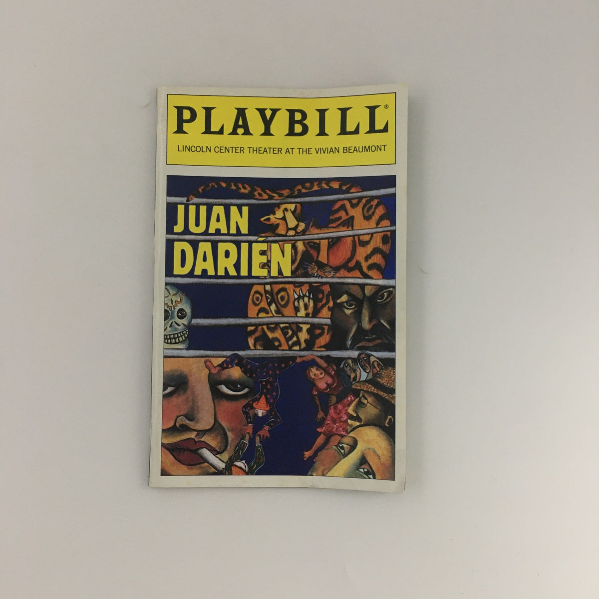 1996 Playbill for Lincoln Center Theater production of Juan Darien featuring vibrant artwork with theatrical characters.