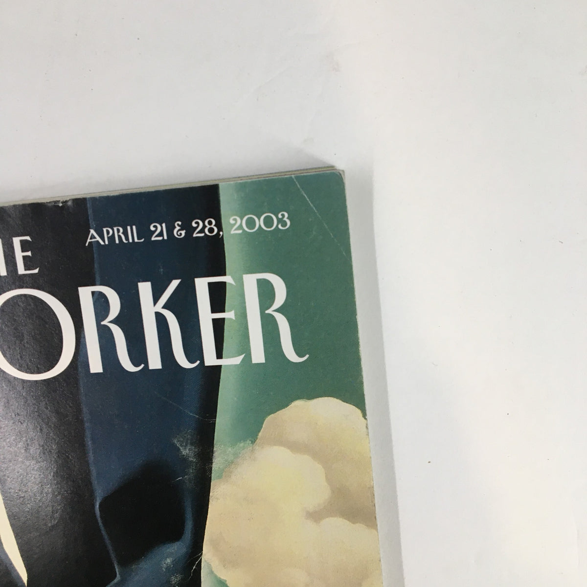 Side view of The New Yorker Magazine April 21, 2003, displaying the publication date and logo.