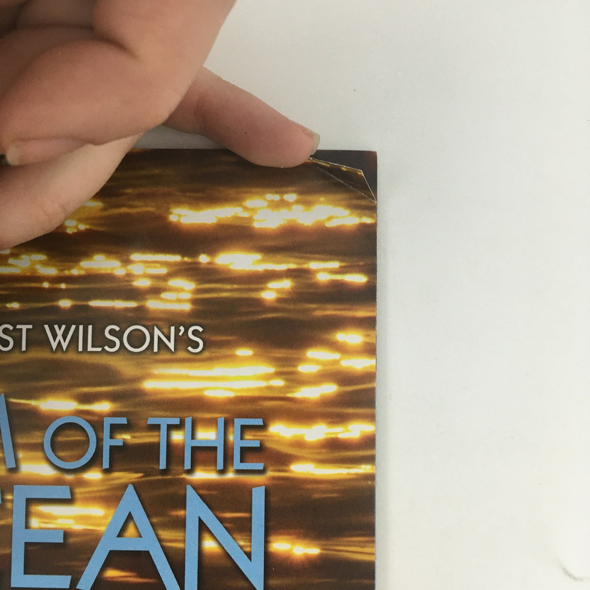 Corner detail of August Wilson's 'Gem of the Ocean', showing minor creases on the cover, from the 2005 McCarter Theatre Center edition.