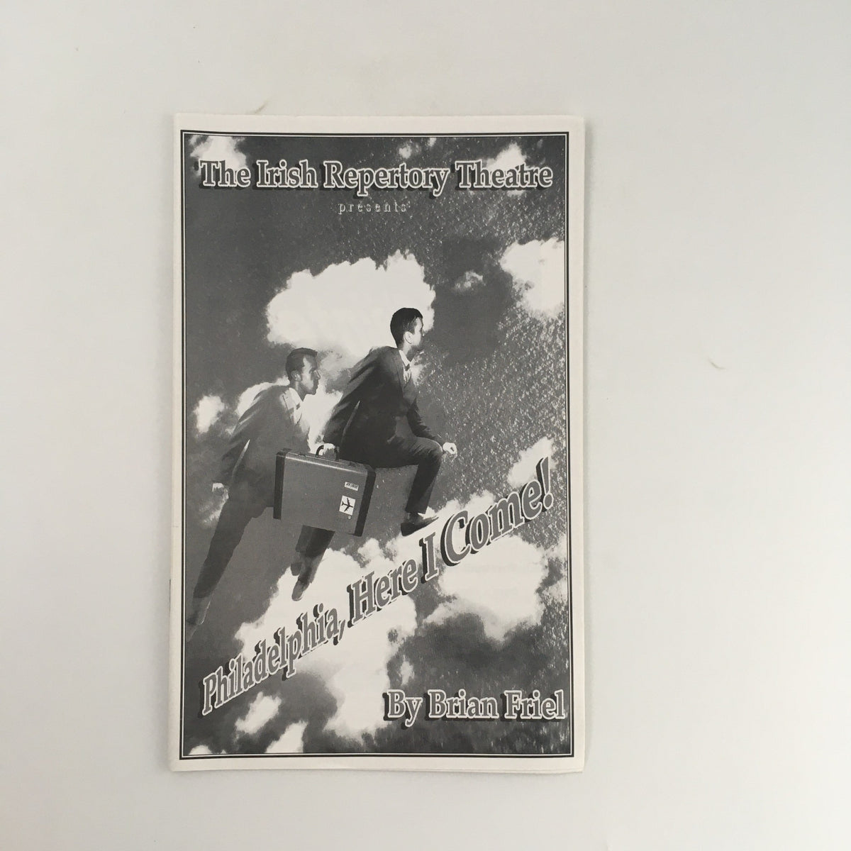 2005 The Irish Repertory Theatre promotional image for 'Philadelphia Here I Come', featuring actors in a surreal sky backdrop.