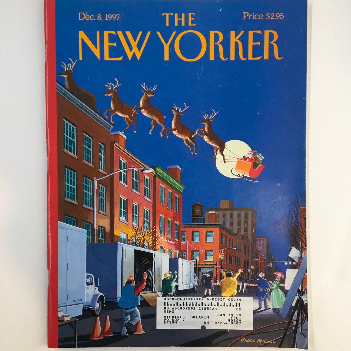 The New Yorker Full Magazine December 8, 1997 featuring festive cover art by Bruce McCall depicting a colorful cityscape with reindeer and Santa Claus flying above.