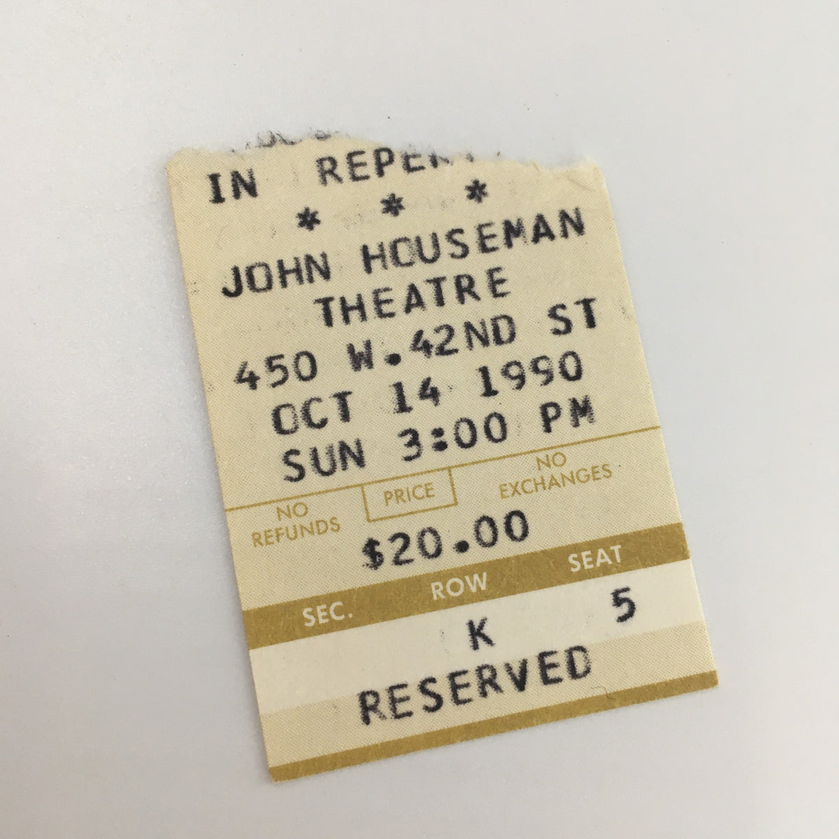 In-person ticket stub for the 1990 performance of 'Handy Dandy' at the John Houseman Theatre, showcasing details of the show date and reserved seating.