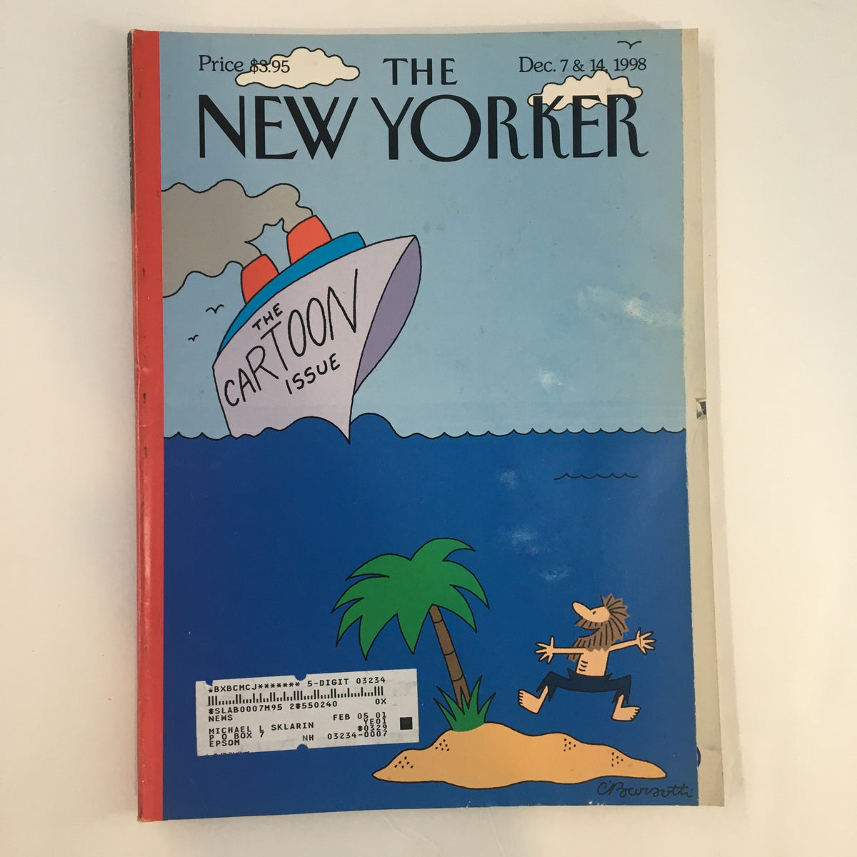 Cover of The New Yorker Full Magazine December 7, 1998, featuring a cartoon illustration by Charles Barsotti depicting a whimsical ship labeled 'The Cartoon Issue' and a sunbather on a tropical island.