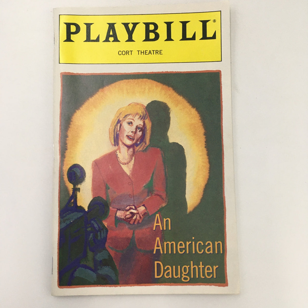 1997 Playbill for 'An American Daughter' by Wendy Wasserstein, featuring a colorful illustration on the cover, showcasing the theatrical production at Cort Theatre.