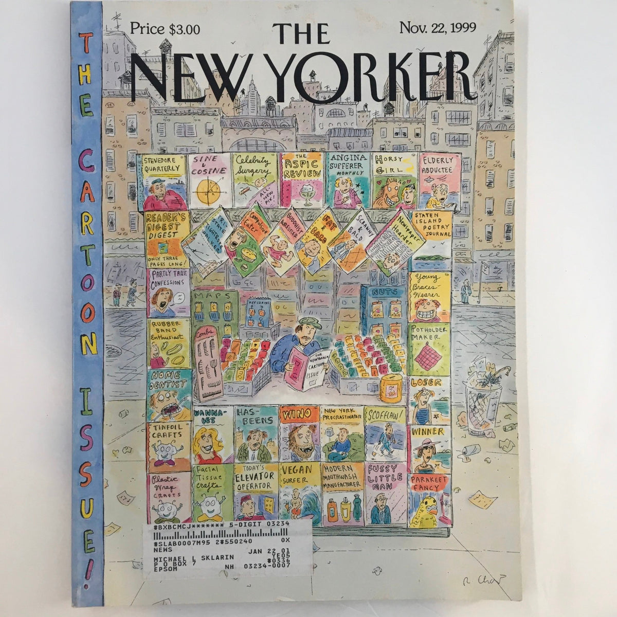 The New Yorker Full Magazine November 22 1999, featuring a colorful cartoon cover with various magazine titles displayed at a newsstand, highlighting the theme 'The Cartoon Issue'. Good condition with address label present.