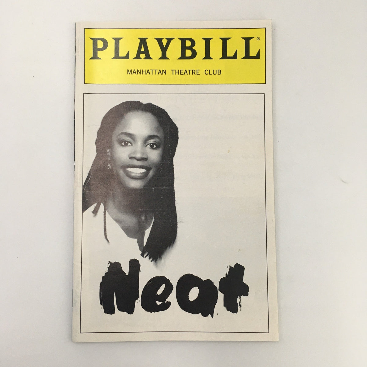 1997 Playbill for Manhattan Theatre Club's production of 'Neat' by Charlayne Woodard featuring a portrait of the actress.
