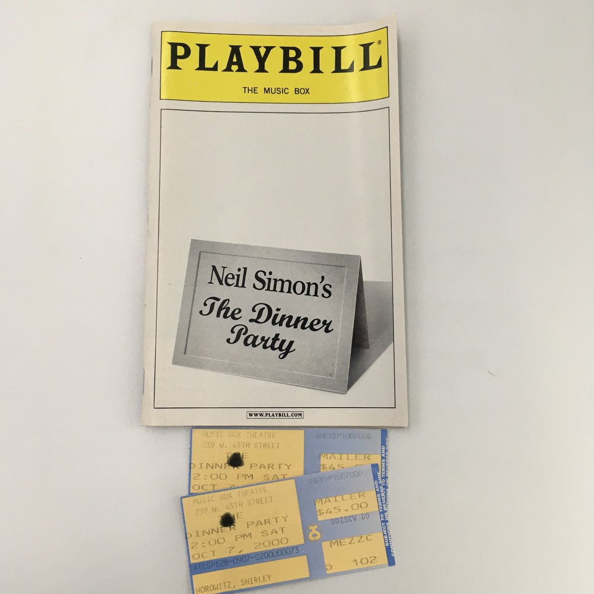 2000 Playbill for Neil Simon's 'The Dinner Party' at The Music Box featuring original tickets, showcasing theatrical memorabilia with Henry Winkler and John Ritter.