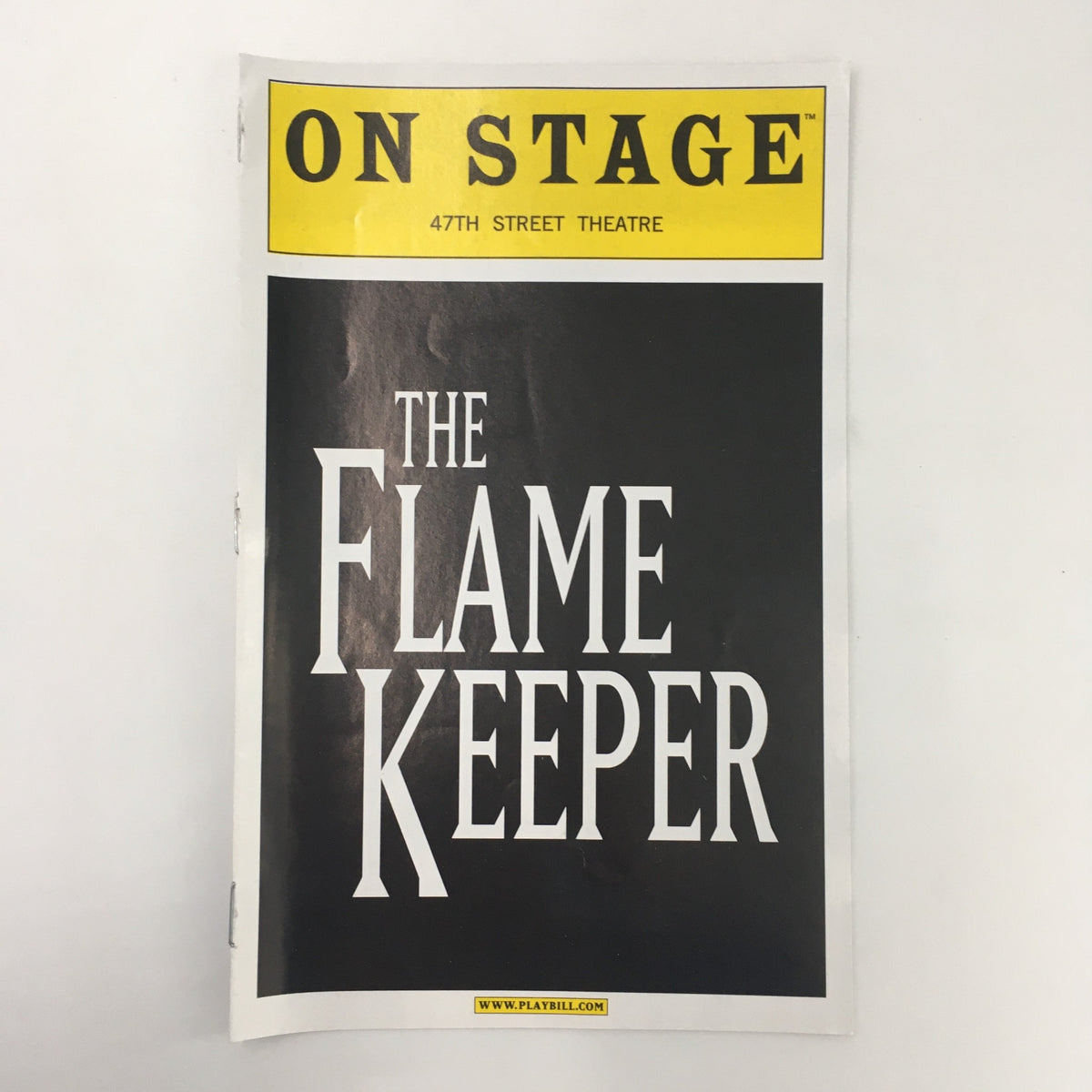 2000 Playbill for 'The Flame Keeper' at 47th Street Theatre, showcasing the title prominently on the cover.