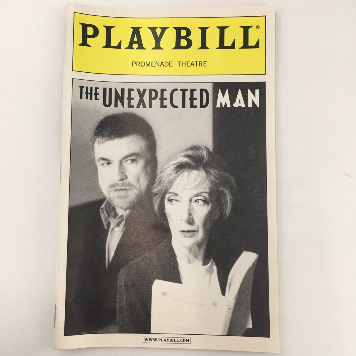 2000 Playbill for 'The Unexpected Man' featuring Eileen Atkins and Alan Bates, showcasing a striking black and white cover from The Promenade Theatre.