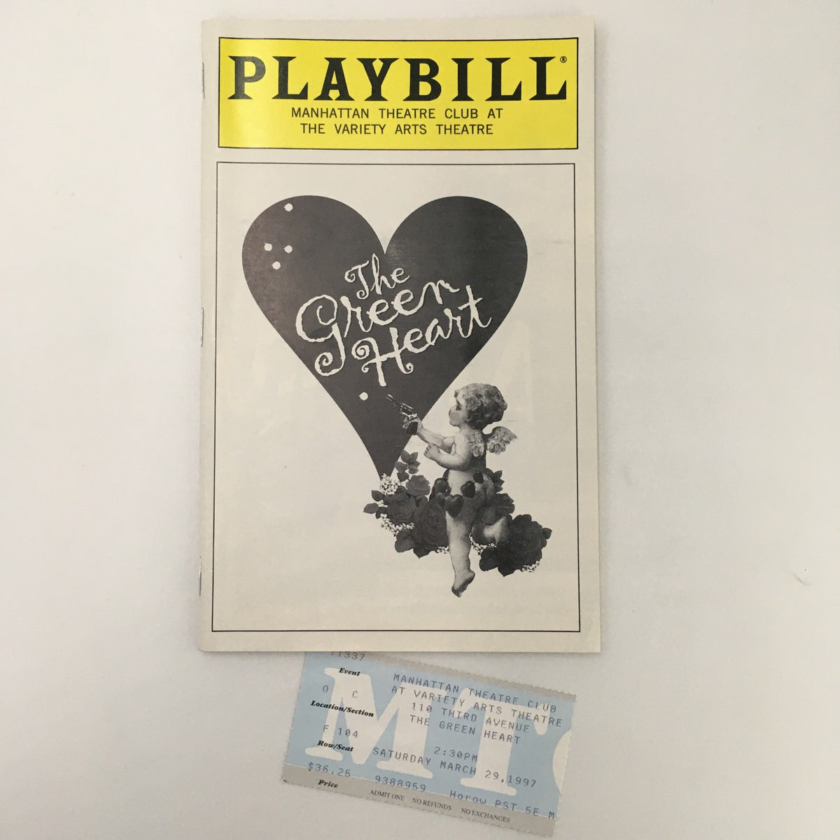 1997 Playbill for 'The Green Heart' at the Variety Arts Theatre, featuring a vintage design with an angel and heart motif, including an original ticket for the performance on March 29, 1997.