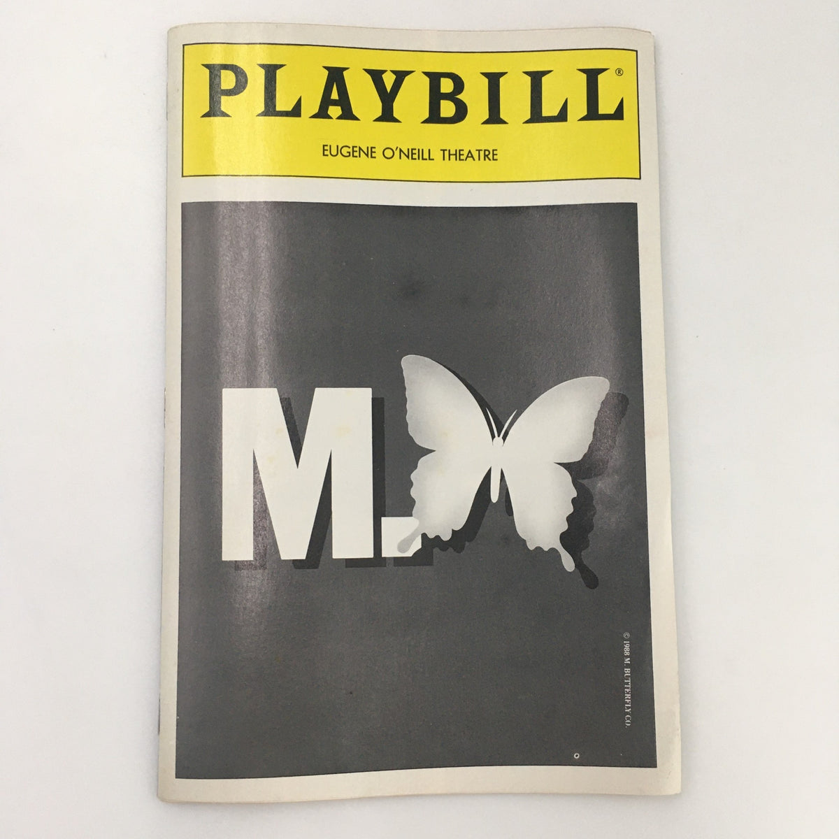 1989 Playbill for 'M. Butterfly' at Eugene O'Neill Theatre featuring a striking cover with a butterfly design.