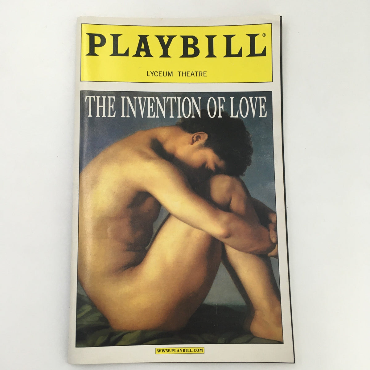 2001 Playbill from the Lyceum Theatre featuring 'The Invention of Love' with a cover image depicting a nude figure in a thoughtful pose.