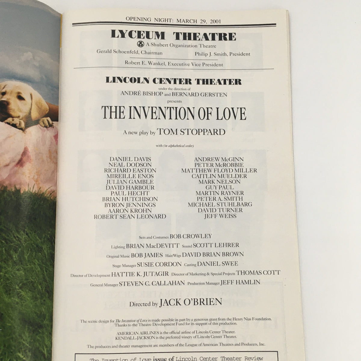 2001 Playbill for 'The Invention of Love' at Lyceum Theatre featuring cast names, including Daniel Davis and Neal Dodson. Stylish layout depicting the opening night details.