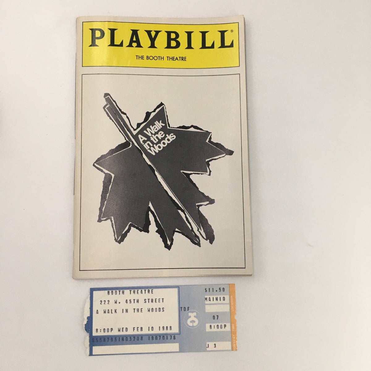 1988 Playbill from Booth Theatre featuring 'A Walk in the Woods' by Lee Blessing, accompanied by the original ticket stub.