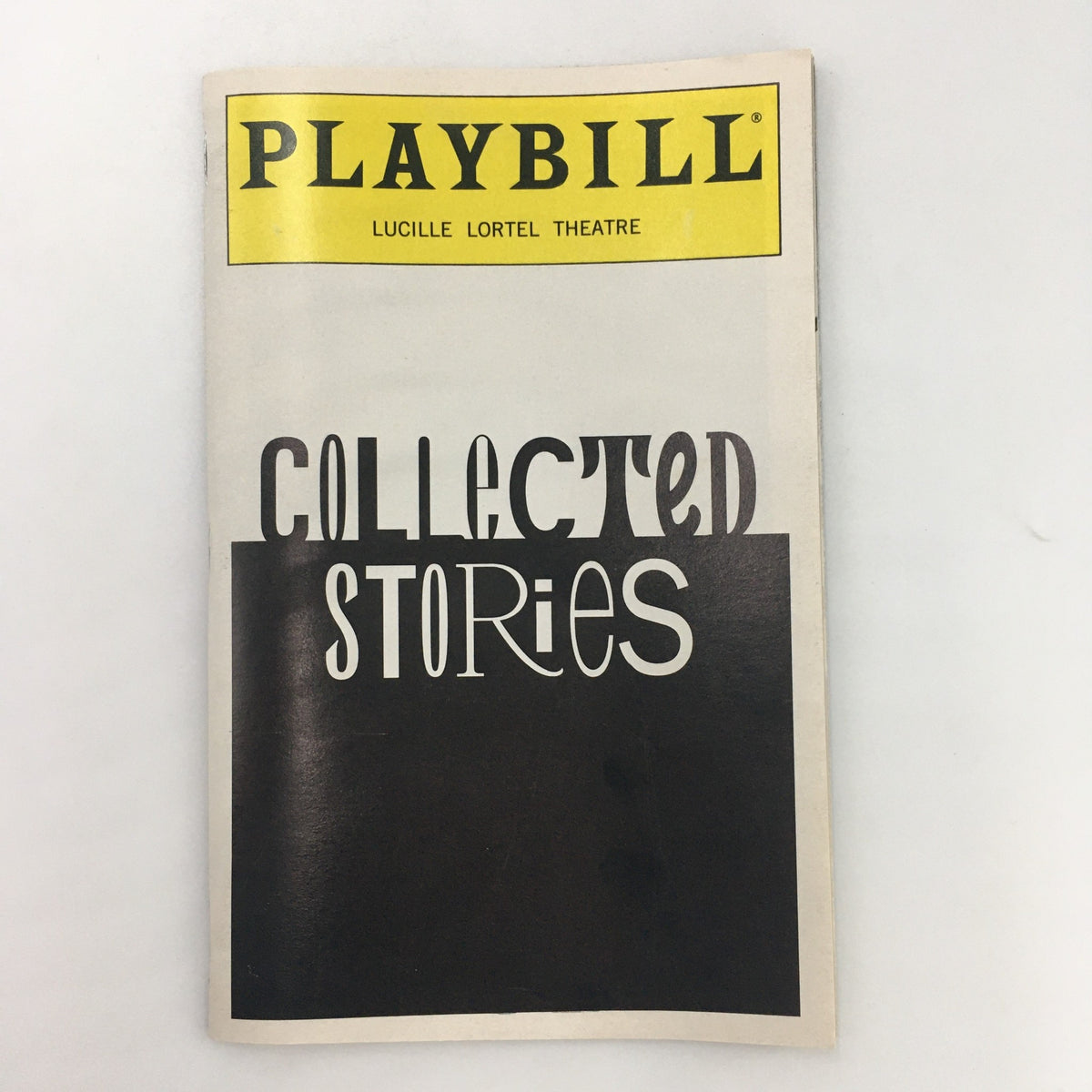 1998 Playbill for 'Collected Stories' by Donald Margulies at Lucille Lortel Theatre, highlighting the artistic design and title of the production.
