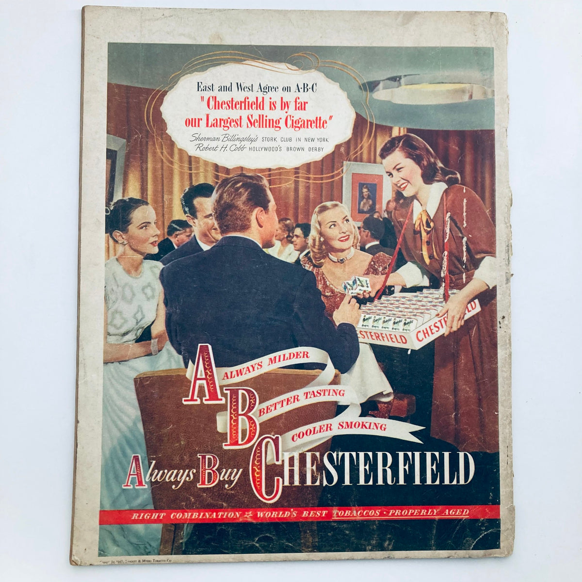 Cover of the VTG Look Magazine from April 29, 1947, Vol 11 No. 9 featuring an advertisement for Chesterfield cigarettes, showcasing a social gathering in a vintage setting, capturing the charm of post-war America.