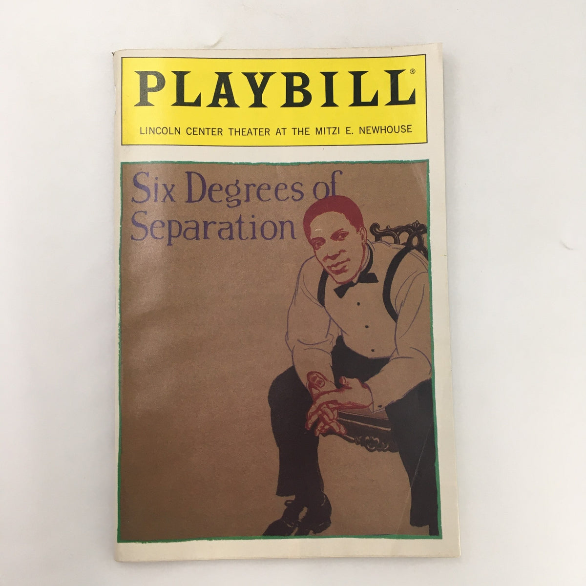 1990 Playbill for 'Six Degrees of Separation' by John Guare, featuring the cover illustration of a man in a tuxedo at the Mitzi E. Newhouse Theater.