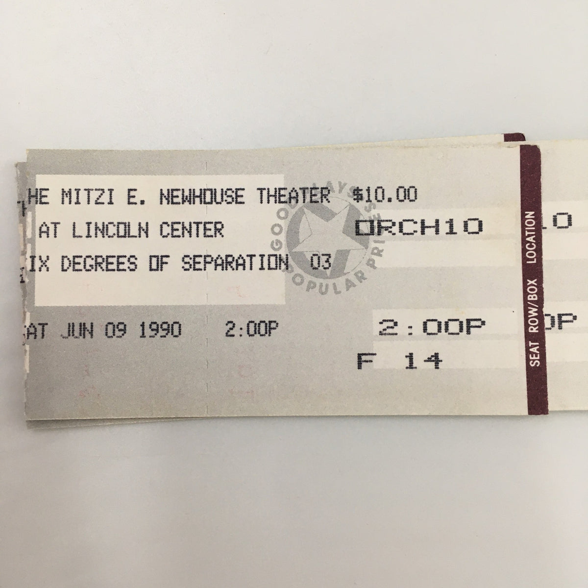 Close-up of an original ticket from the 1990 production of 'Six Degrees of Separation' at the Mitzi E. Newhouse Theater, highlighting performance details and pricing.