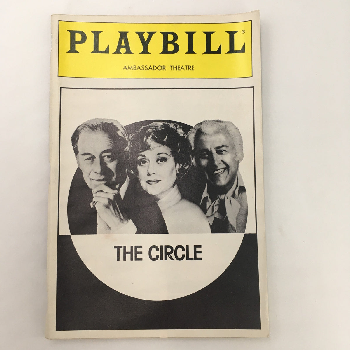 1990 Playbill from Ambassador Theatre featuring ‘The Circle’ by W. Somerset Maugham, showcasing three cast members on the cover.