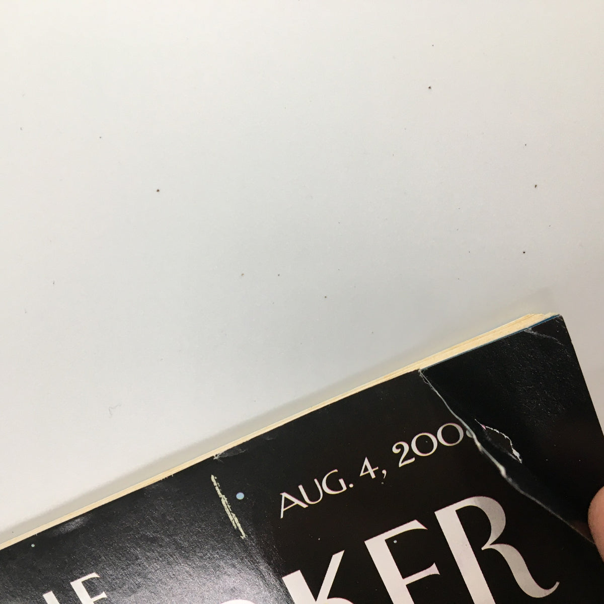 Close-up view of the corner of The New Yorker Full Magazine August 4 2008 Night Cap by Kim DeMarco, showing minor wear and tear.
