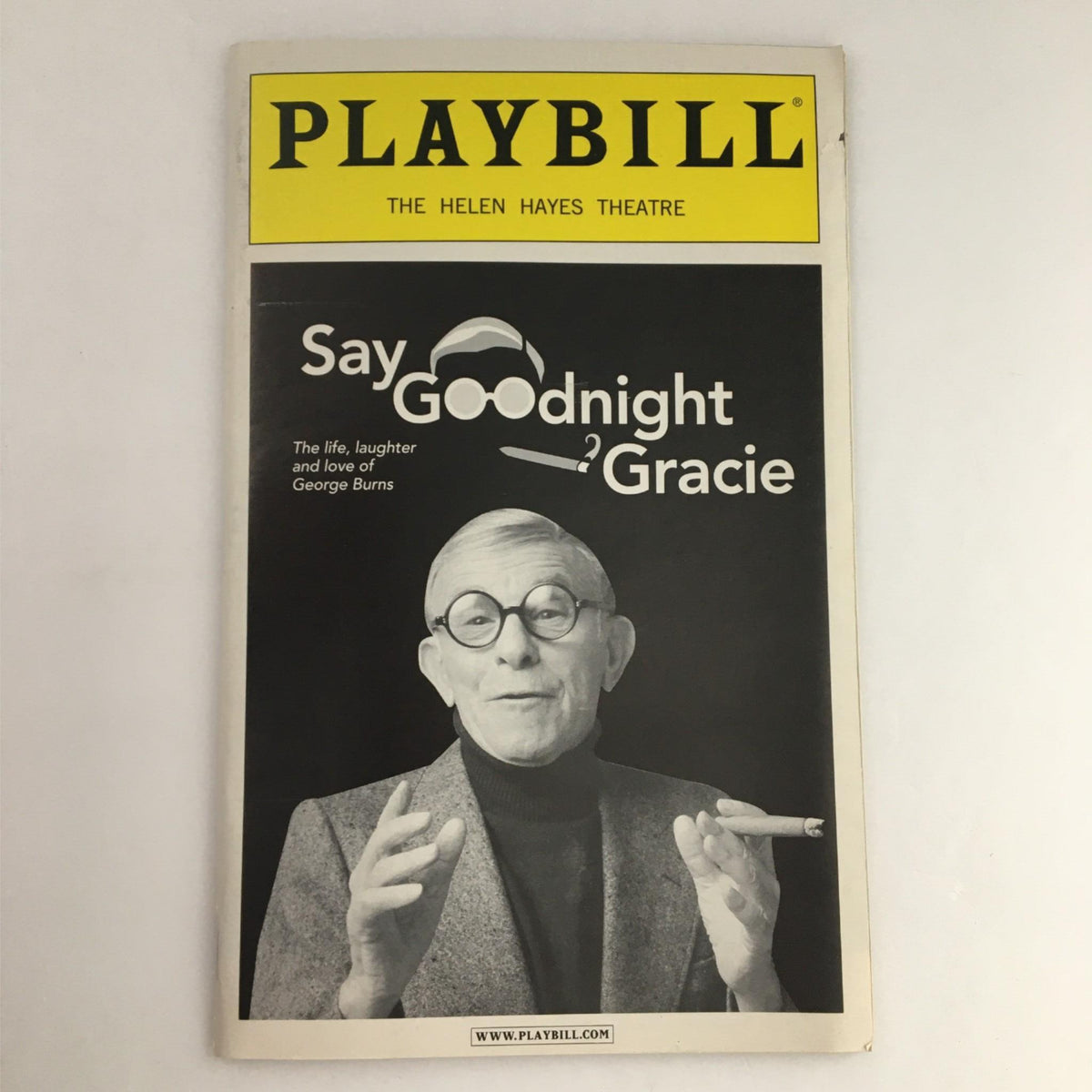 2002 Playbill Say Goodnight Gracie by The Helen Hayes Theatre featuring a black and white image of George Burns, highlighting the life, laughter, and love associated with the legendary comedian.