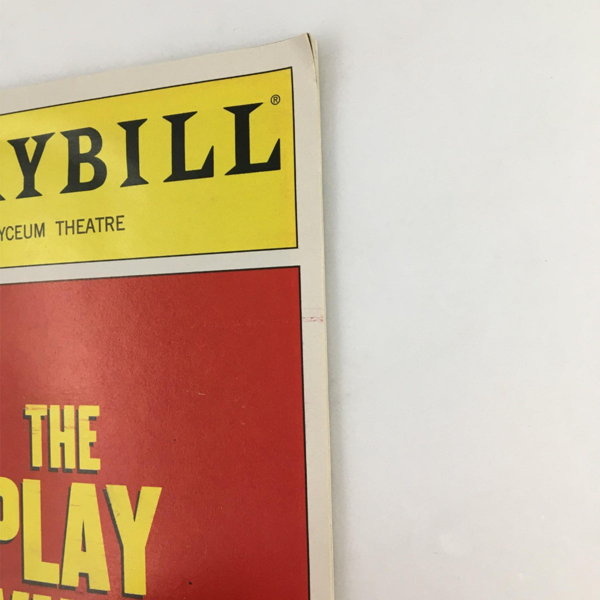 Side angle of the 2003 Playbill for 'The Play What I Wrote', displaying minor wear and the iconic design.