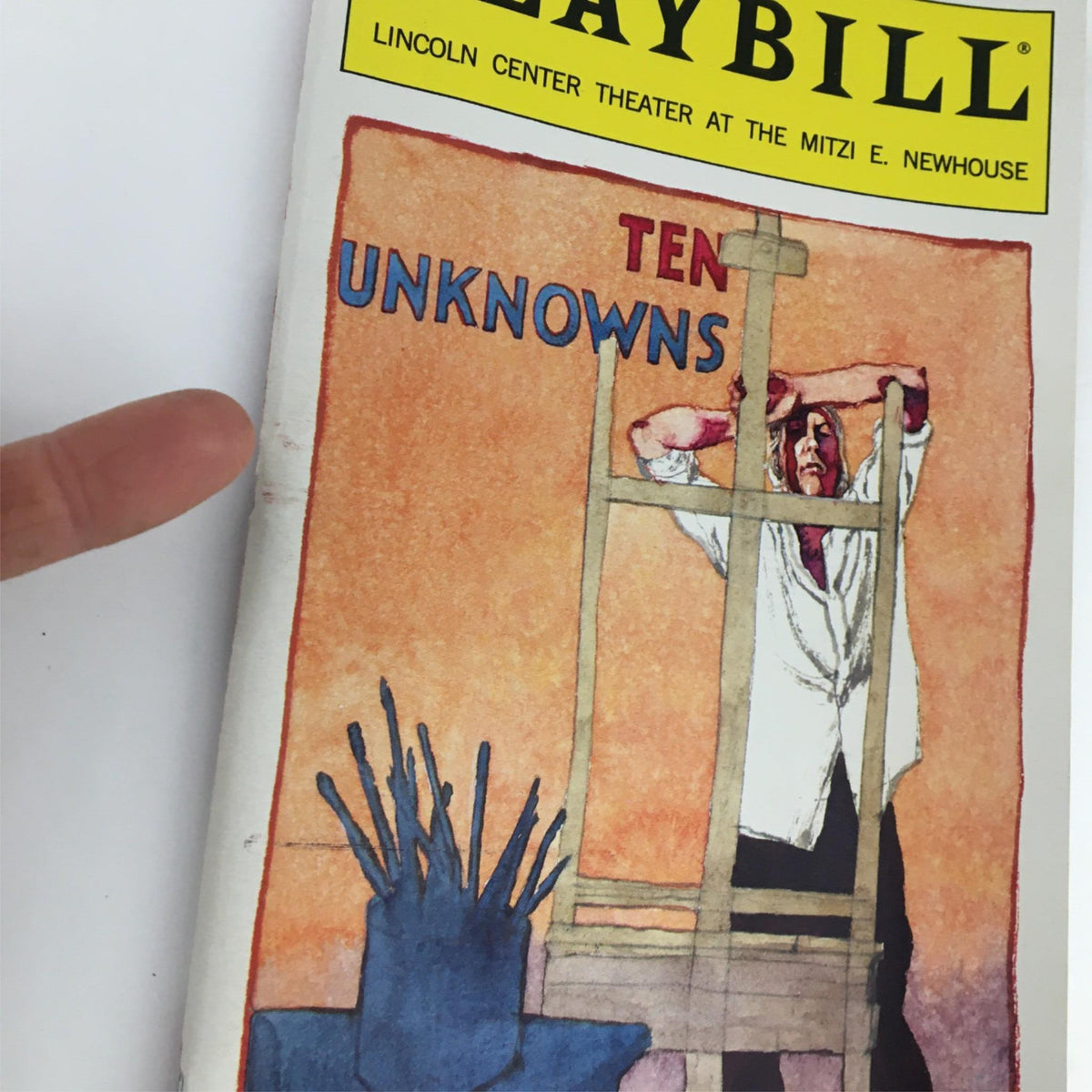 Close-up view of the 2001 Playbill The Unknowns by Lincoln Center Theater at the Mitzi E. Newhouse, highlighting the cover details and title 'Ten Unknowns'.