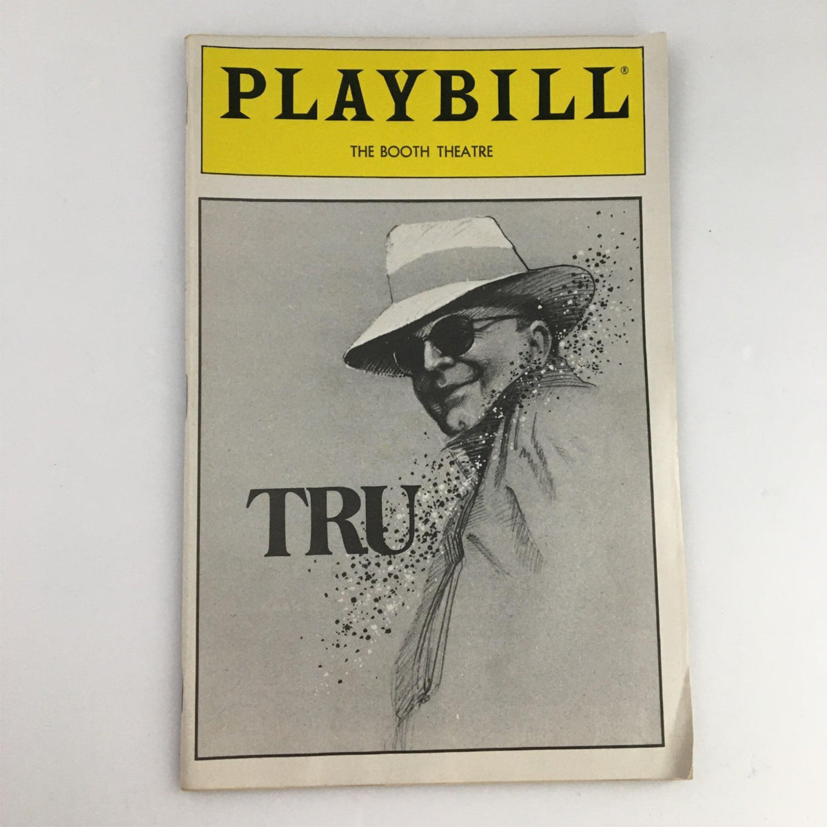 1990 Playbill Tru cover from The Booth Theatre featuring a stylized illustration of a man wearing sunglasses and a hat, representing the production starring Robert Morse.