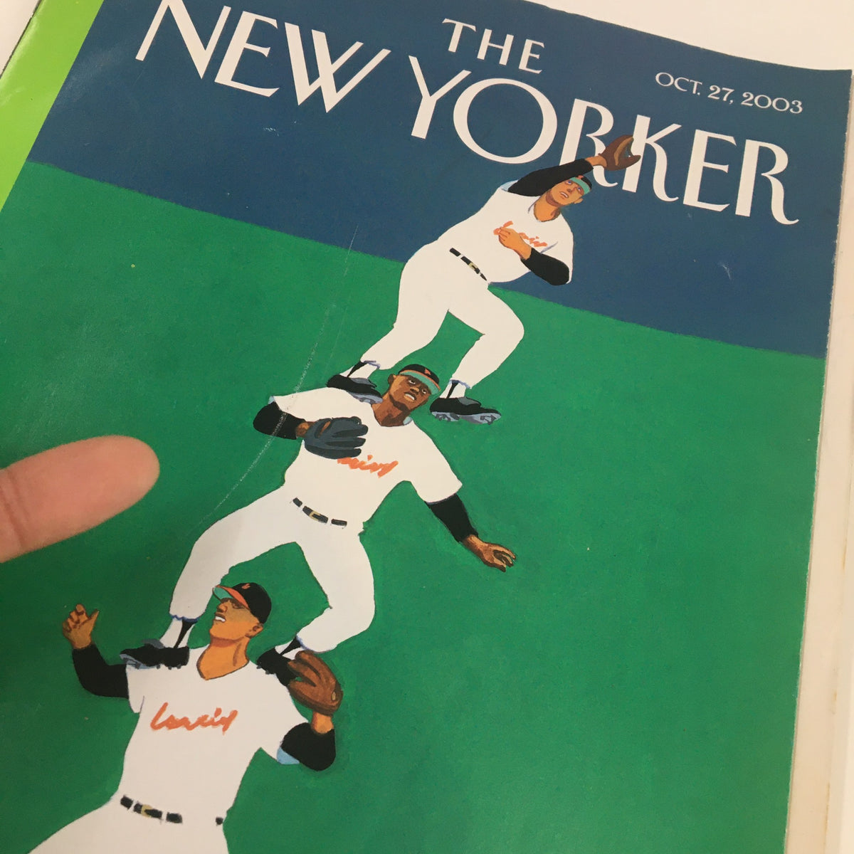 Close-up of The New Yorker Full Magazine October 27 2003 cover showing three baseball players stacked, illustrated by Bruce McCall.