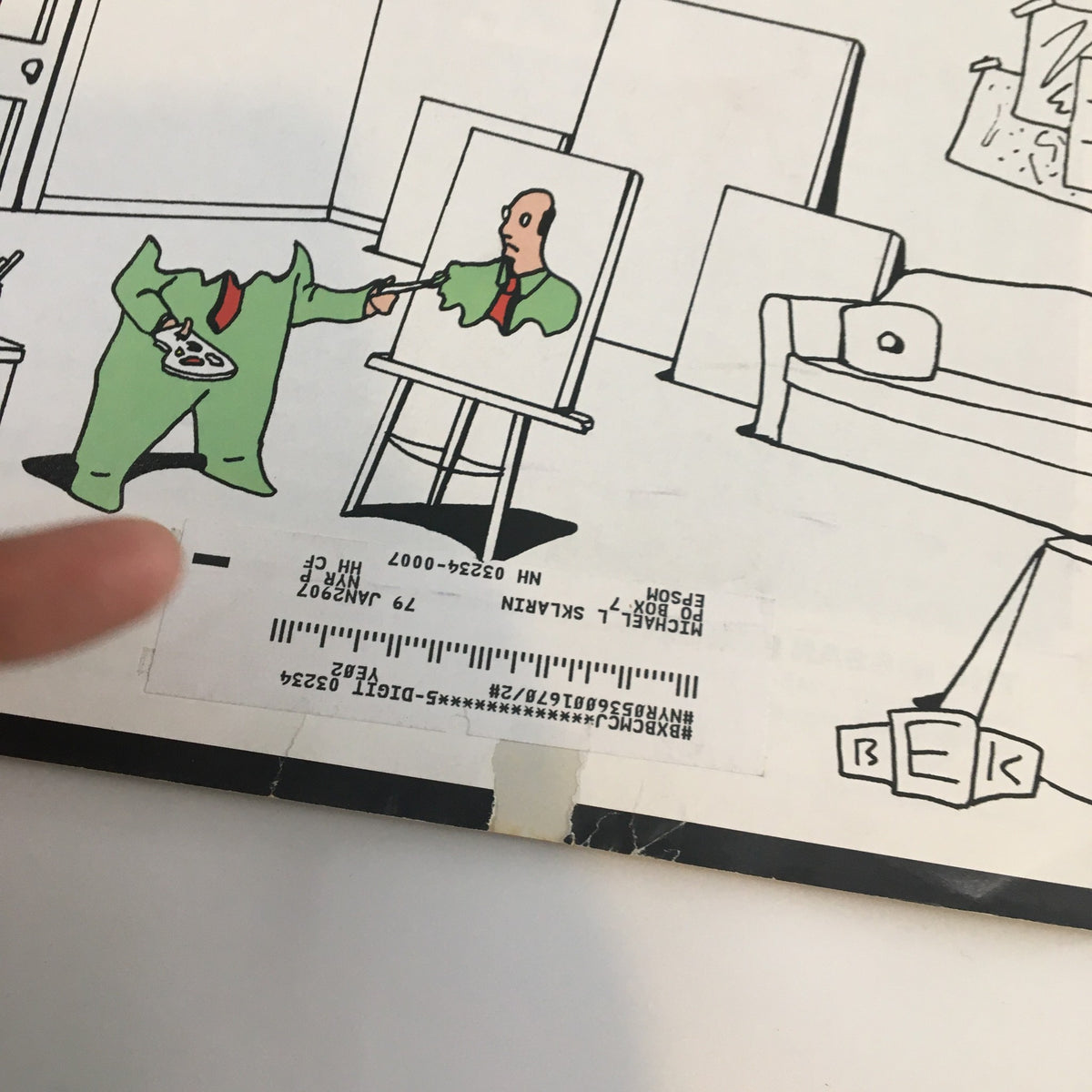 Close-up view of The New Yorker Full Magazine March 29 2004 cover illustrating the character holding a palette and pointing at a self-portrait in progress, with an address label on the bottom.