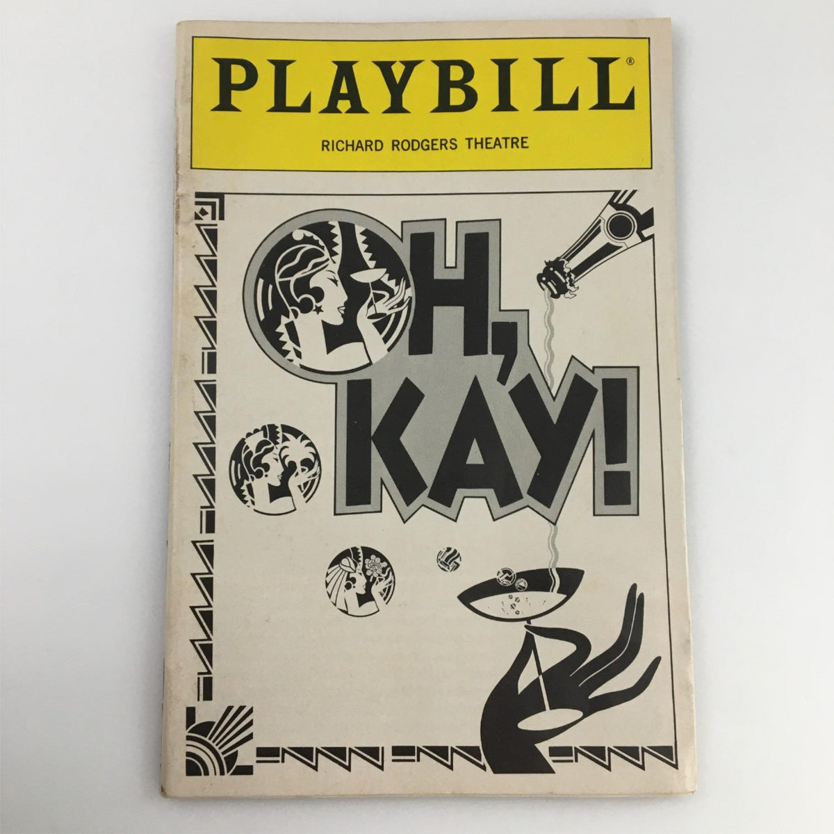 1990 Playbill for Oh, Kay! featuring the iconic graphics of the Richard Rodgers Theatre, showcasing a classic Broadway musical.