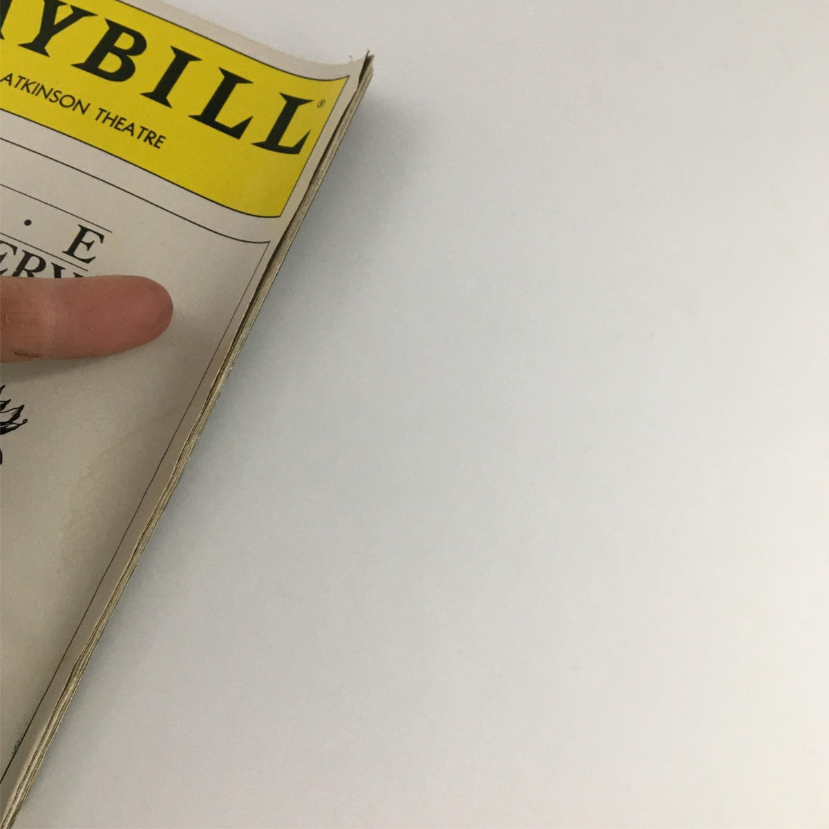 Corner of the 1990 Playbill for The Cemetery Club with the title prominently displayed at Brooks Atkinson Theatre.