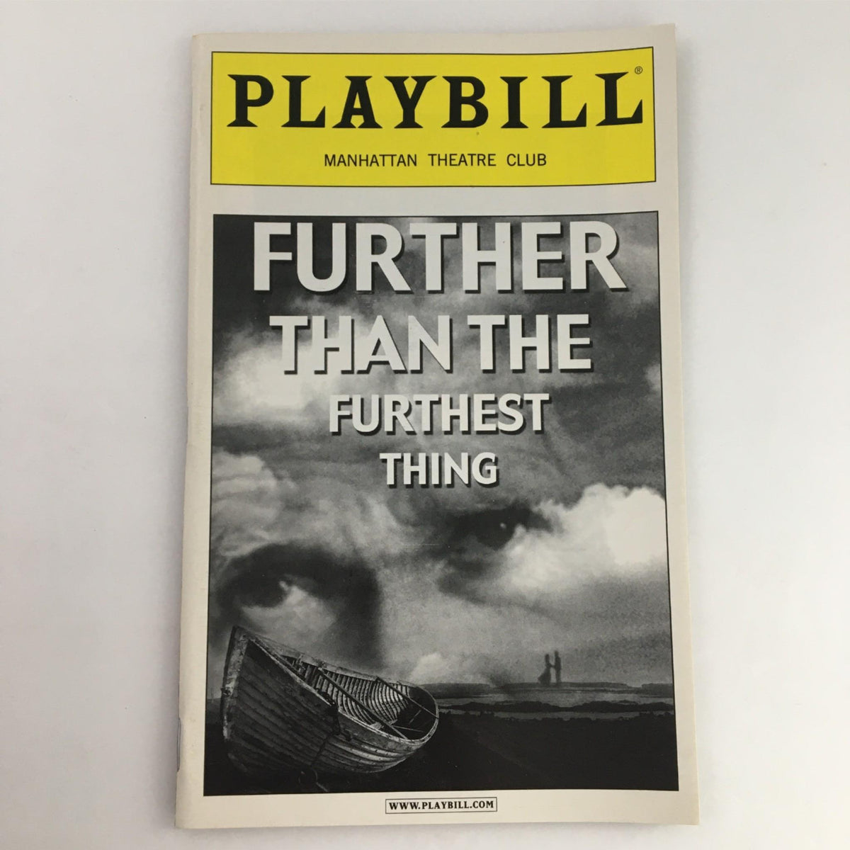 Front cover of the 2002 Playbill for 'Further than the Furthest Thing' by Manhattan Theatre Club, featuring dramatic imagery and title text.