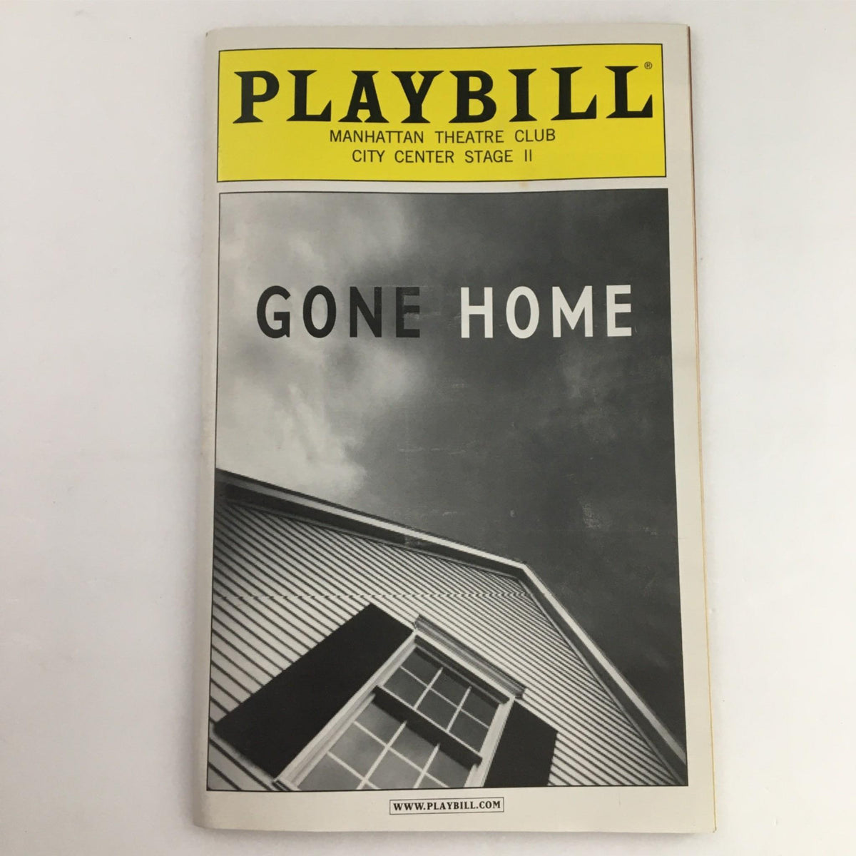 2002 Playbill for the production 'Gone Home' featuring a striking black and white image of a house with window shutters. A nostalgic piece from Lincoln Center Theater.