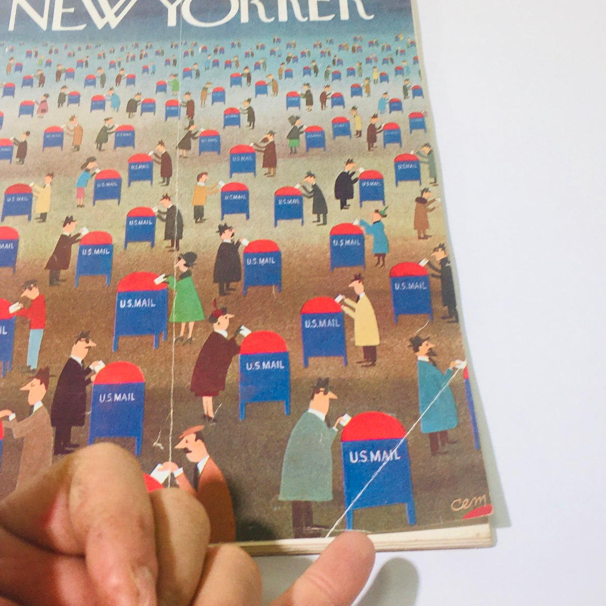 Close-up of The New Yorker: April 14 1962 magazine cover highlighting the detailed illustration of individuals interacting with U.S. Mailboxes, emphasizing vintage art style.