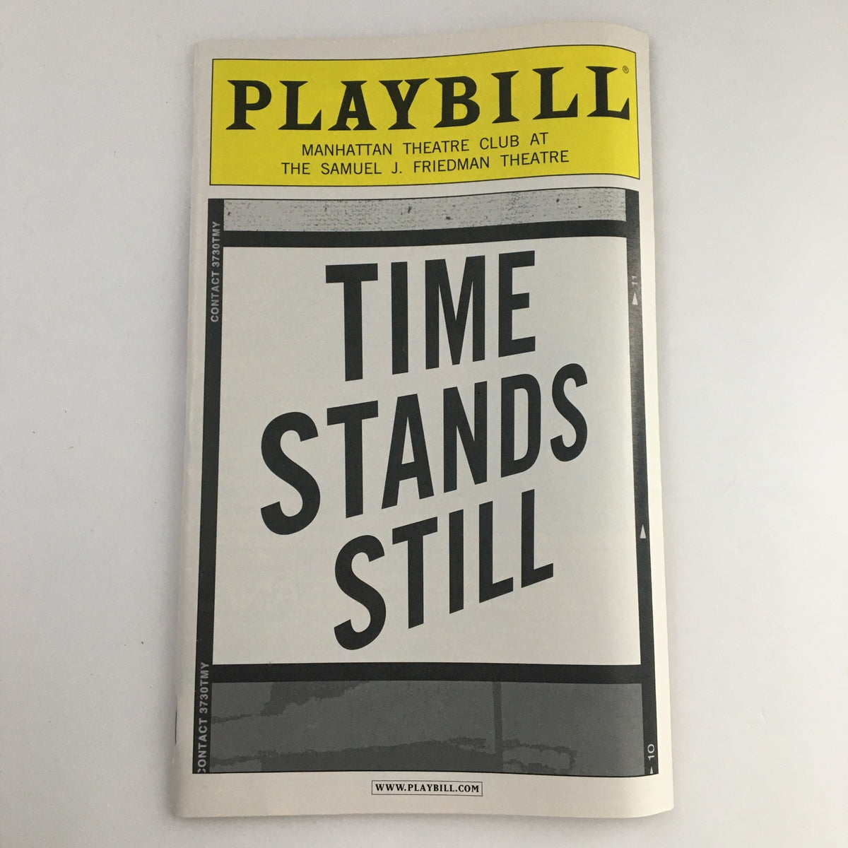 2010 Playbill for 'Time Stands Still' at Samuel J. Friedman Theatre, showcasing the front cover design with bold lettering.