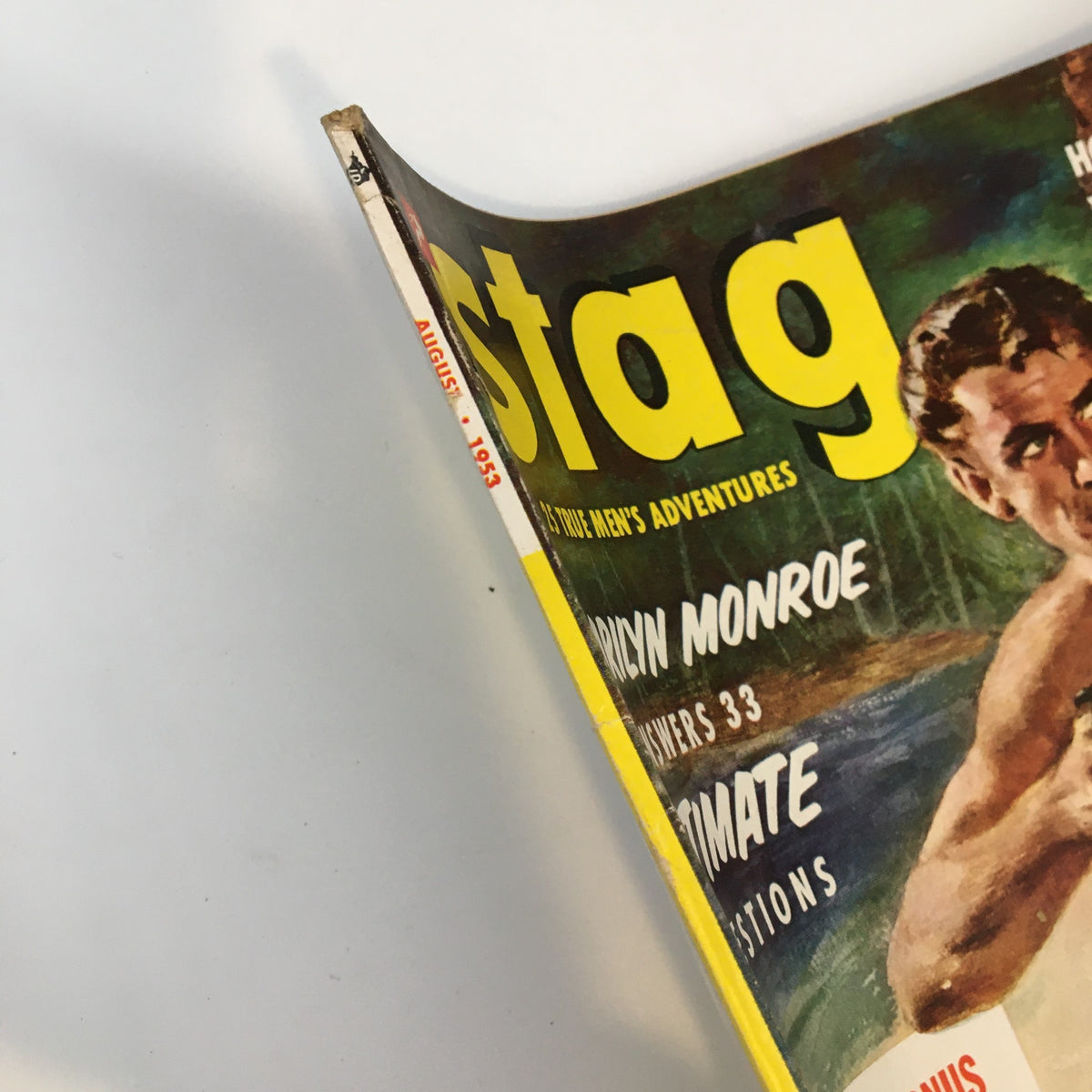 Cover edge of the VTG Stag Magazine August 1953 showcasing the magazine title and Marilyn Monroe's name, emphasizing its collectible nature.