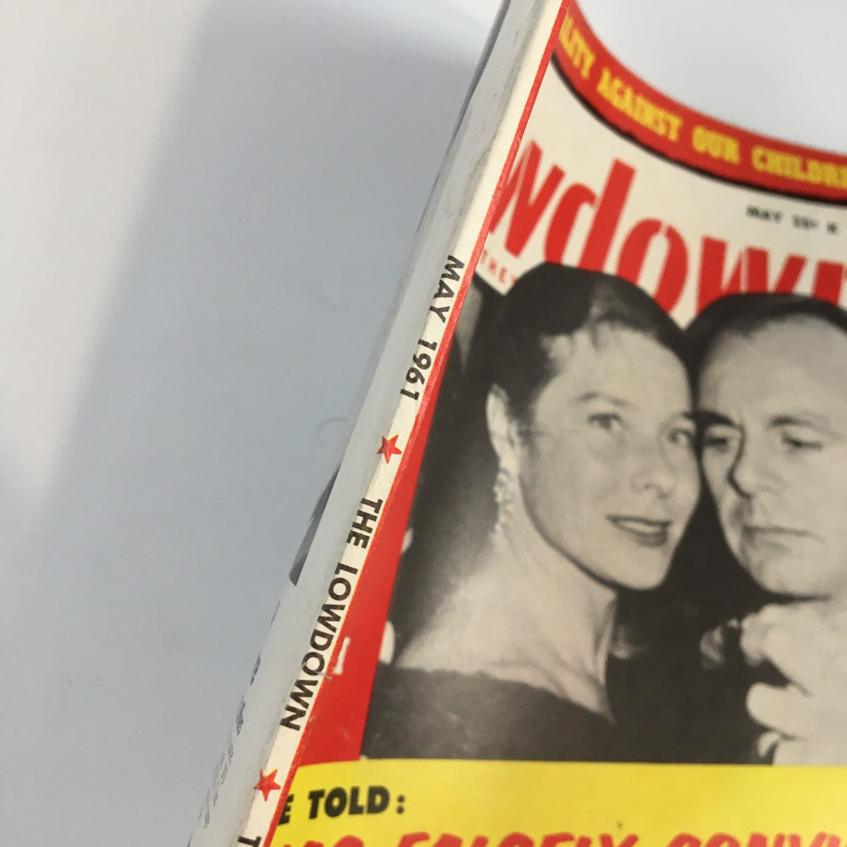 Cover of VTG The Lowdown Magazine May 1961 featuring The Secret Life of Aly Khan and a close-up of a couple at an event.