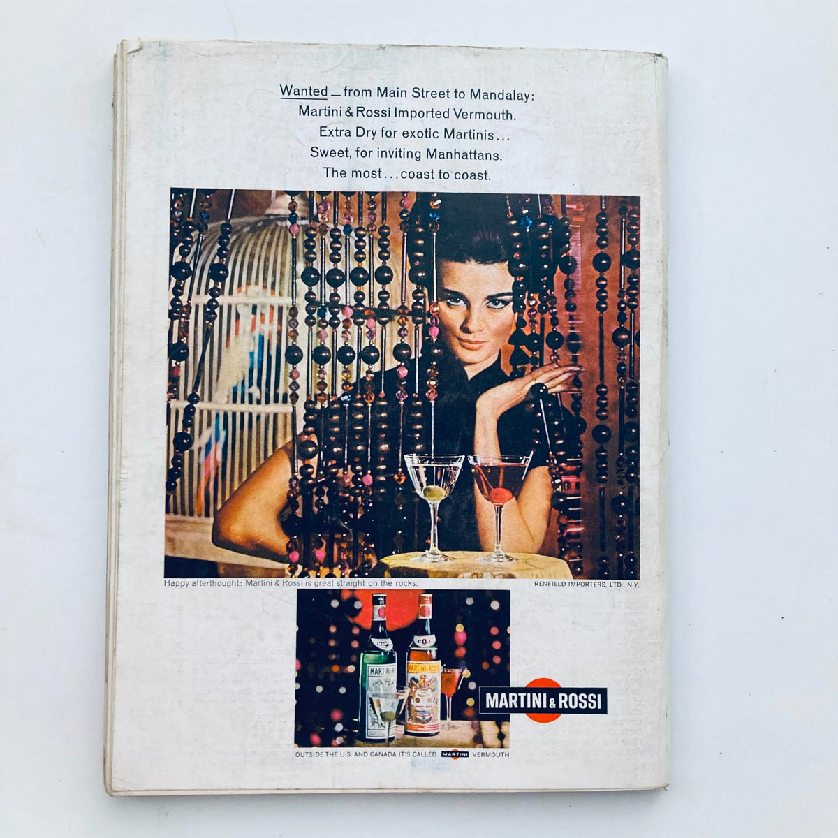 Back cover of the VTG Playboy Magazine September 1966 featuring an advertisement for Martini & Rossi vermouth, illustrating the vintage design and style of the era.