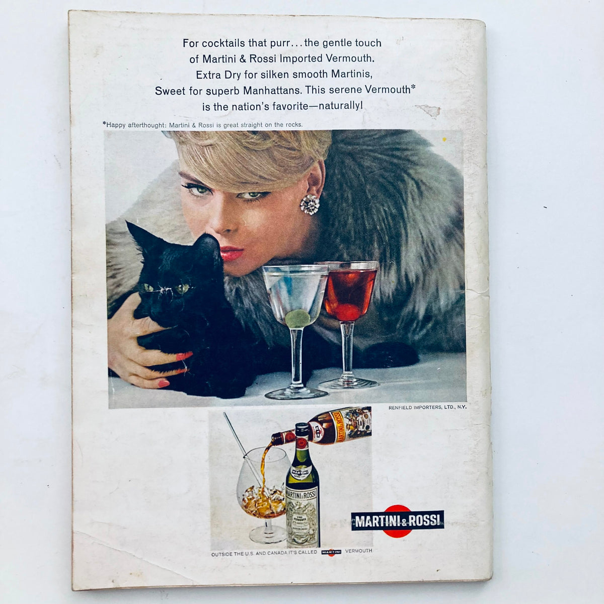 Vintage advertisement on the back cover of VTG Playboy Magazine June 1966 featuring a stylish woman with a black cat and martini glasses.