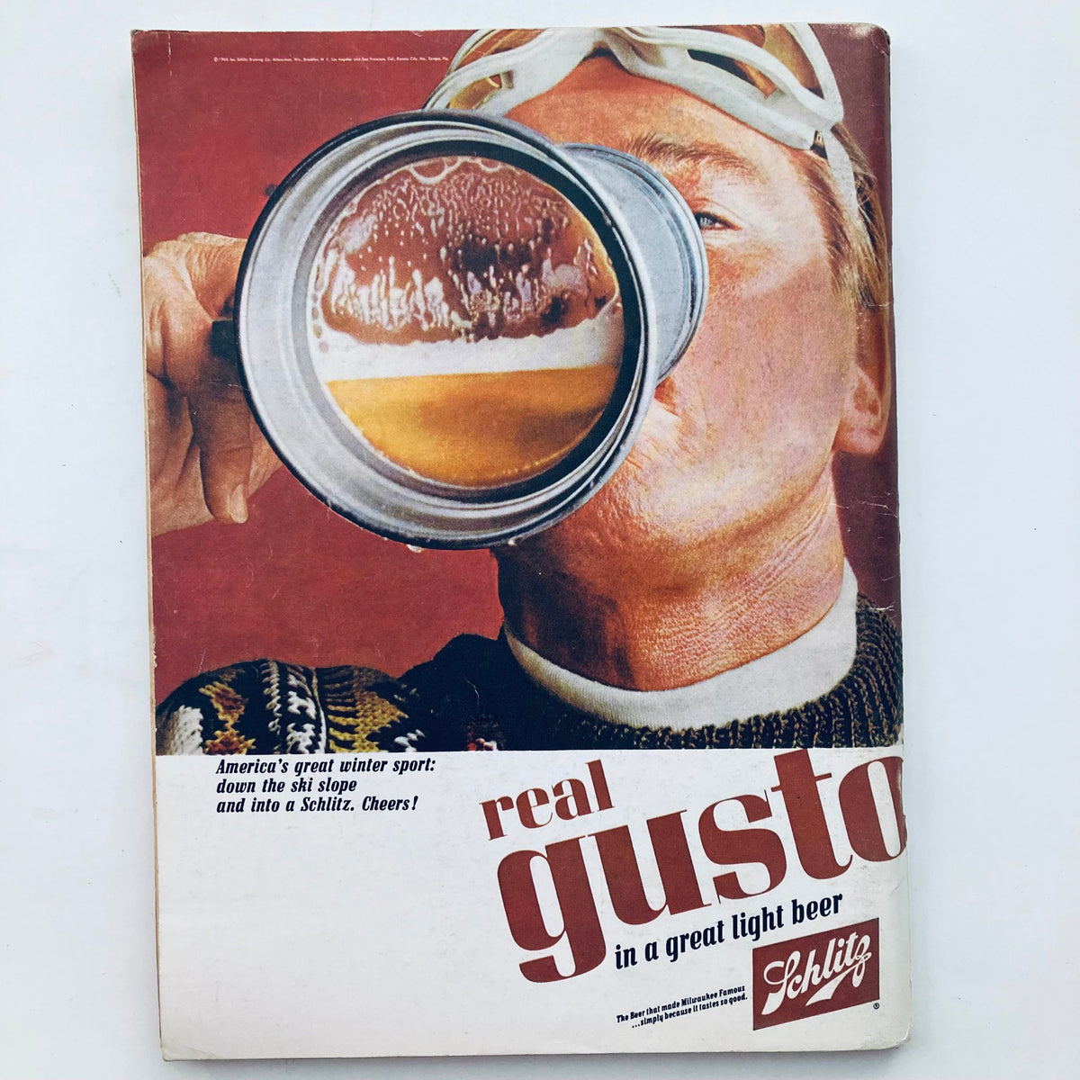 Vintage advertising cover from the January 1966 issue of Playboy Magazine featuring a skier enjoying Schlitz beer, reflecting 1960s pop culture.