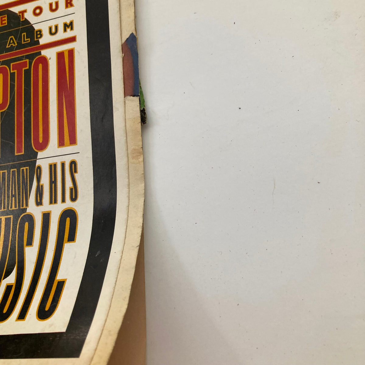 Side view of Rolling Stone Magazine April 29, 1993, Issue 655, illustrating the edge of the magazine with text 'Clapton The Man & His Music' visible, capturing vintage publication details.