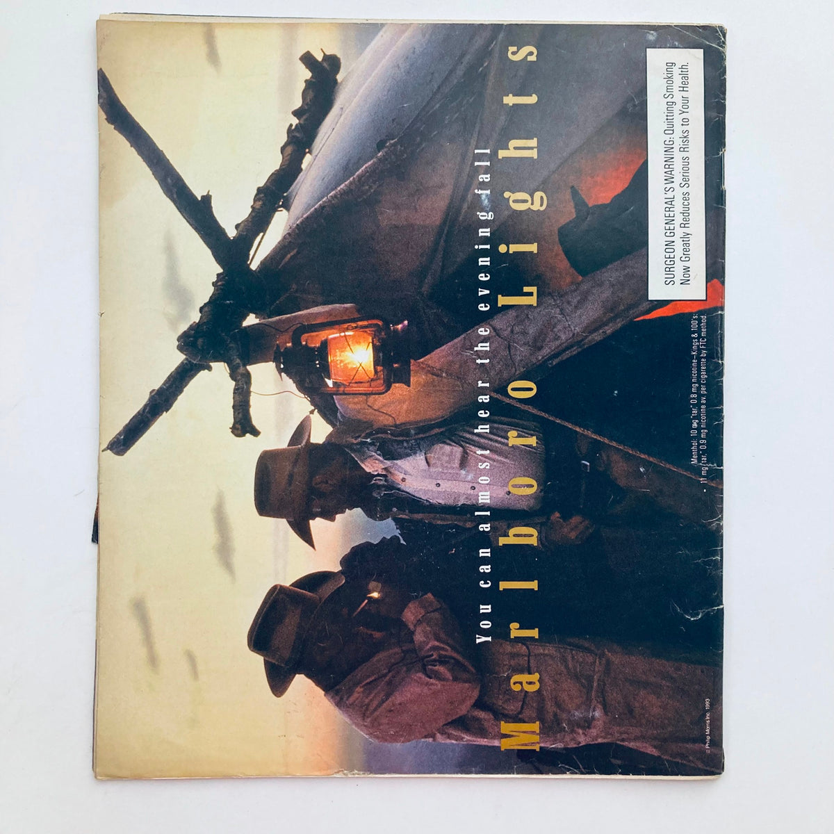 Back cover of Rolling Stone Magazine April 29 1993 Issue 655, featuring a photographic advertisement for Marlboro Lights, illustrating a rustic scene with cowboys.