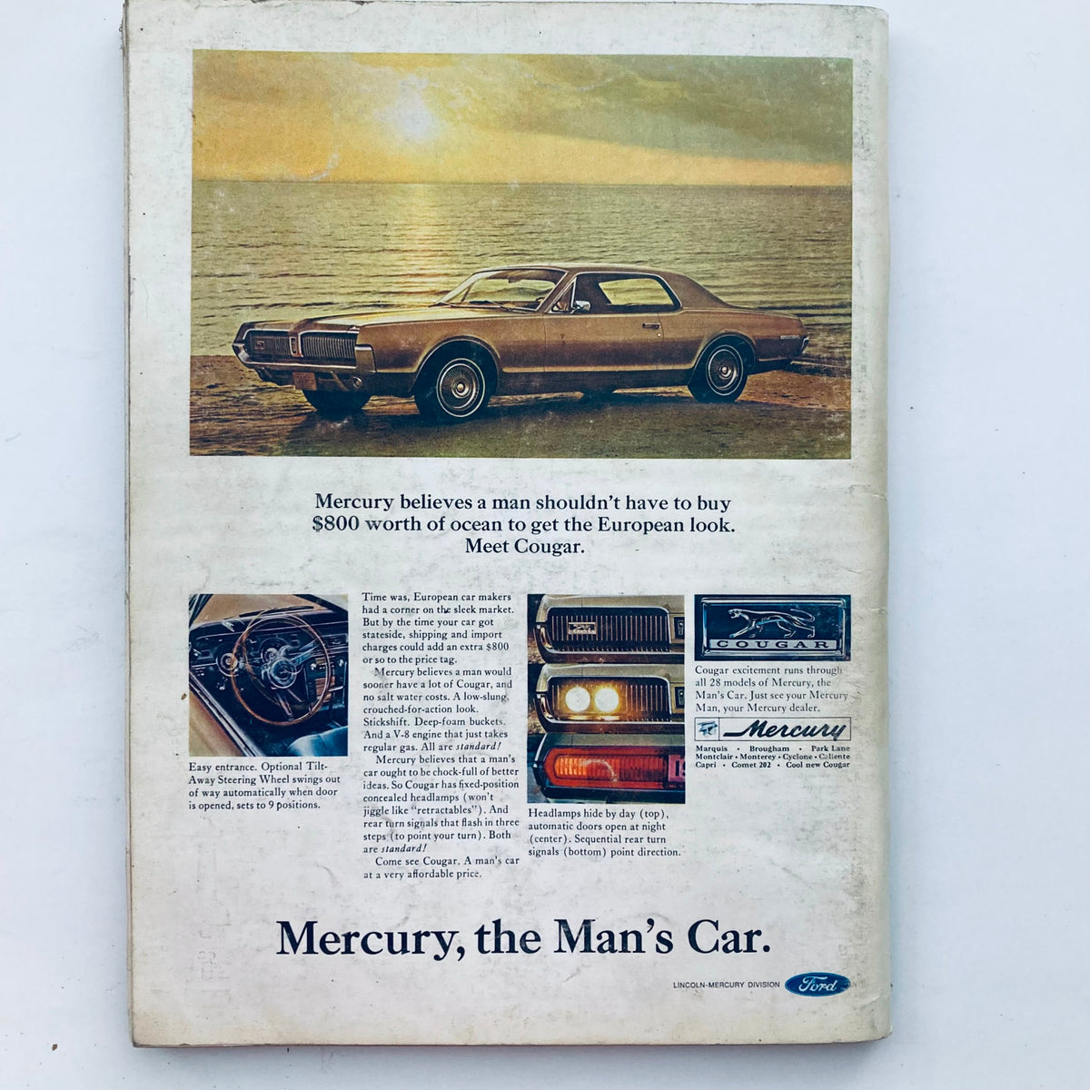 Advertisement page from VTG Playboy Magazine December 1966 featuring a Mercury Cougar car, illustrating vintage automotive advertising.