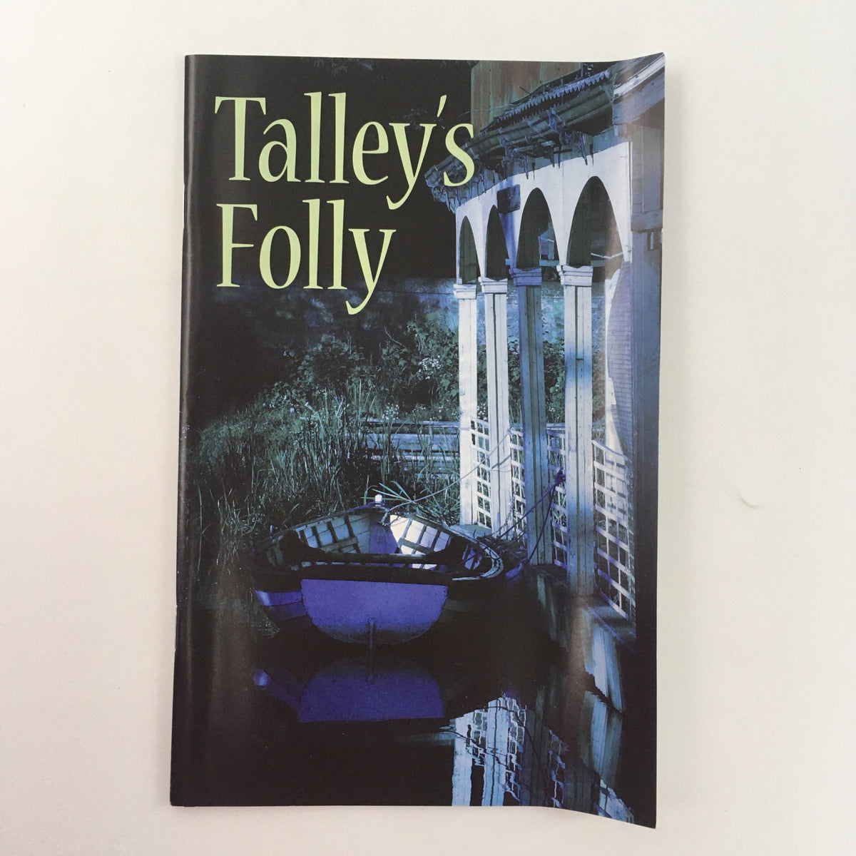 Cover of the 2008 McCarter Theatre Center program for 'Talley's Folly' by Lanford Wilson, featuring an image of a boat beside an architectural structure in a reflective setting.